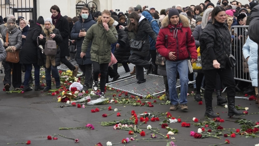 People break barriers after a van with the coffin of Russian opposition leader Alexei Navalny left the Church of the Icon of the Mother of God Soothe My Sorrows, in Moscow, Russia, Friday, March 1, 2024. Alexei Navalny, Russia's top opposition leader and President Vladimir Putin's fiercest foe, has been buried in Moscow, two weeks after his still-mysterious death in an Arctic prison. (AP Photo)