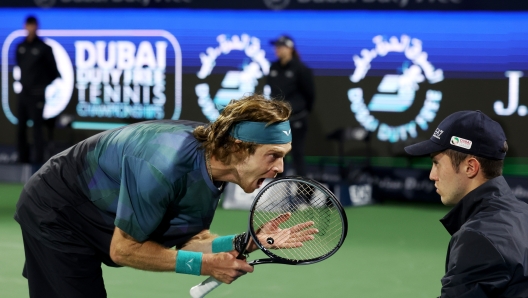 DUBAI, UNITED ARAB EMIRATES - MARCH 01: Andrey Rublev shouts at line judge while playing against Alexander Bublik of Kazakhstan in their semifinal match during the Dubai Duty Free Tennis Championships at Dubai Duty Free Tennis Stadium on March 01, 2024 in Dubai, United Arab Emirates. (Photo by Christopher Pike/Getty Images)