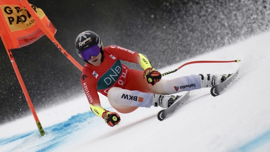 Switzerland's Lara Gut Behrami speeds down the course during an alpine ski, women's World Cup super-G race, in Kvitfjell, Norway, Saturday, March 2, 2024. (AP Photo/Gabriele Facciotti)