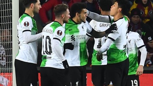 Liverpool's Colombian midfielder #07 Luis Diaz (C) celebrates scoring his team's fourth goal with team mates during the UEFA Europa League round of 16 first leg football match between AC Sparta Praha and Liverpool FC in Prague on March 7, 2024. (Photo by MICHAL CIZEK / AFP)