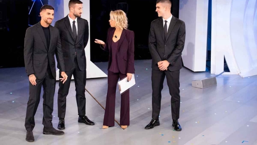 Maria De Filippi con Gianluca Mancini, Lorenzo Pellegrini e Bryan Cristante