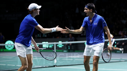 MALAGA, SPAIN - NOVEMBER 25: Jannik Sinner celebrates a point with Lorenzo Sonego of Italy during the Semi-Final doubles match against Miomir Kecmanovic and Novak Djokovic of Serbia in the Davis Cup Final at Palacio de Deportes Jose Maria Martin Carpena on November 25, 2023 in Malaga, Spain. (Photo by Clive Brunskill/Getty Images for ITF)