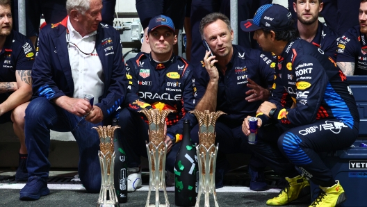 JEDDAH, SAUDI ARABIA - MARCH 09: Oracle Red Bull Racing Team Consultant Dr Helmut Marko, Race winner Max Verstappen of the Netherlands and Oracle Red Bull Racing, Oracle Red Bull Racing Team Principal Christian Horner and Second placed Sergio Perez of Mexico and Oracle Red Bull Racing celebrate after the F1 Grand Prix of Saudi Arabia at Jeddah Corniche Circuit on March 09, 2024 in Jeddah, Saudi Arabia. (Photo by Clive Rose/Getty Images)