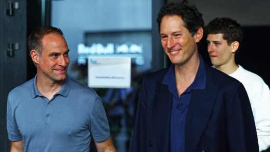 JEDDAH, SAUDI ARABIA - MARCH 09: Oliver Mintzlaff, Managing Director of Red Bull GmbH and John Elkann, Chairman and CEO of Ferrari talk in the Paddock prior to the F1 Grand Prix of Saudi Arabia at Jeddah Corniche Circuit on March 09, 2024 in Jeddah, Saudi Arabia. (Photo by Mark Thompson/Getty Images)