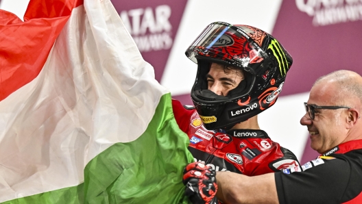 epa11212020 Italian MotoGP rider Francesco Bagnaia of Ducati Lenovo Team celebrates after winning the Motorcycling Grand Prix of Qatar at the Losail International Circuit in Doha, Qatar, 10 March 2024  EPA/NOUSHAD THEKKAYIL