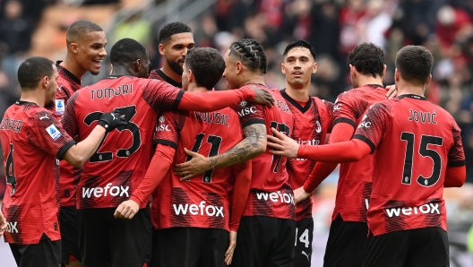 MILAN, ITALY - MARCH 10: Christian Pulisic of AC Milan celebrates with team-mates after scoring the opening goal during the Serie A TIM match between AC Milan and Empoli FC - Serie A TIM  at Stadio Giuseppe Meazza on March 10, 2024 in Milan, Italy. (Photo by Claudio Villa/AC Milan via Getty Images)