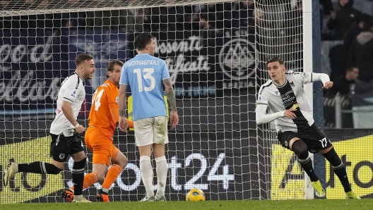 Udinese's Lorenzo Lucca celebrates after scoring his side's first goal during a Serie A soccer match between Lazio and Udinese, at Rome's Olympic Stadium, Monday, March 11, 2024. (AP Photo/Andrew Medichini)