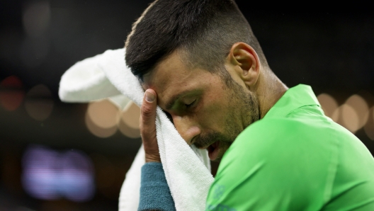 INDIAN WELLS, CALIFORNIA - MARCH 11: Novak Djokovic of Serbia shows his dejection during his three set defeat against Luca Nardi of Italy in their third round match during the BNP Paribas Open at Indian Wells Tennis Garden on March 11, 2024 in Indian Wells, California.   Clive Brunskill/Getty Images/AFP (Photo by CLIVE BRUNSKILL / GETTY IMAGES NORTH AMERICA / Getty Images via AFP)