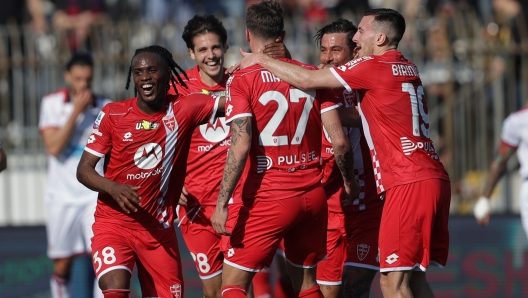 AC Monza's players celebrate the goal scored by AC Monza's forward Daniel Maldini during the Italian Serie A soccer match between AC Monza and Cagliari at U-Power Stadium in Monza, Italy, 16 March 2024. ANSA / ROBERTO BREGANI