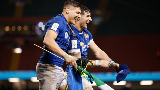 epa11224363 Ignacio Brex (L) and Tommaso Menoncello of Italy celebrate at the end of the Six Nations rugby match between Wales and Italy in Cardiff, Wales, Britain, 16 March 2024.  EPA/DAVID CLIFF