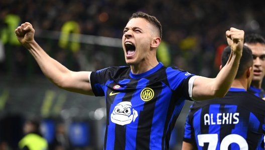 MILAN, ITALY - MARCH 04: Kristjan Asllani of FC Internazionale celebrates after scoring the first goal during the Serie A TIM match between FC Internazionale and Genoa CFC - Serie A TIM  at Stadio Giuseppe Meazza on March 04, 2024 in Milan, Italy. (Photo by Mattia Pistoia - Inter/Inter via Getty Images)