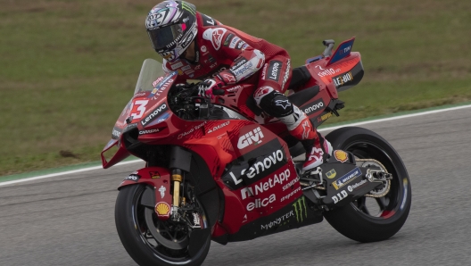 LAGOA, ALGARVE, PORTUGAL - MARCH 22: Enea Bastianini of Italy and Ducati Lenovo Team heads down a straight during the MotoGP Of Portugal - Free Practice at Autodromo do Algarve on March 22, 2024 in Lagoa, Algarve, Portugal. (Photo by Mirco Lazzari gp/Getty Images)