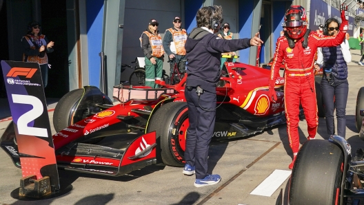 Ferrari driver Carlos Sainz of Spain reacts following his second place finish in the qualifying session for the Australian Formula One Grand Prix at Albert Park, in Melbourne, Australia, Saturday, March 23, 2024. (AP Photo/Scott Barbour)