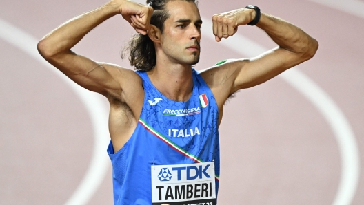 Italy's Gianmarco Tamberi reacts during the men's high jump final during the World Athletics Championships at the National Athletics Centre in Budapest on August 22, 2023. (Photo by Attila KISBENEDEK / AFP)