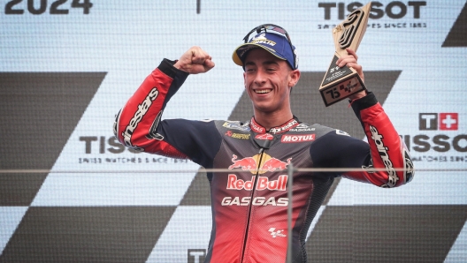 epa11241264 Third placed Pedro Acosta of Spain and Red Bull GASGAS Tech3 celebrates on the podium after the MotoGP race of the Motorcycling Grand Prix of Portugal, in Portimao, Portugal, 24 March 2024.  EPA/JOSE SENA GOULAO