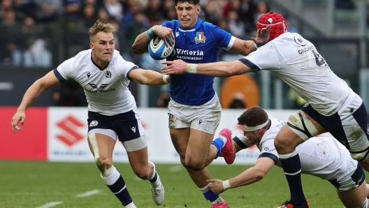 Tommaso Menoncello of Italy in action during the Six Nations rugby match between Italy and Scotland at Olimpico stadium in Rome, Italy, 09 March 2024. ANSA/FEDERICO PROIETTI