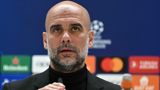 Manchester City's Spanish manager Pep Guardiola gives a press conference on the eve of their UEFA Champions League quarter final first leg football match against Real Madrid CF at the Santiago Bernabeu stadium in Madrid on April 8, 2024. (Photo by JAVIER SORIANO / AFP)