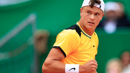 Denmark's Holger Rune reacts after a point as he plays against India's Sumit Nagal during their Monte Carlo ATP Masters Series Tournament round of 32 tennis match on the Rainier III court at the Monte Carlo Country Club on April 10, 2024. (Photo by Valery HACHE / AFP)