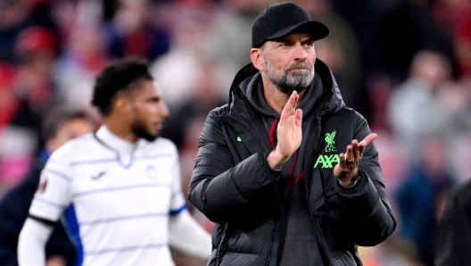 LIVERPOOL, ENGLAND - APRIL 11: Jurgen Klopp, Manager of Liverpool, applauds the fans at full-time following the team's defeat in the UEFA Europa League 2023/24 Quarter-Final first leg match between Liverpool FC and Atalanta at Anfield on April 11, 2024 in Liverpool, England. (Photo by Stu Forster/Getty Images)