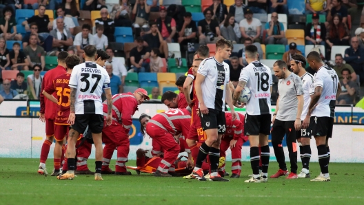 Roma's Evan Ndicka injured during the Serie A soccer match between Udinese and Roma at the Bluenergy Stadium in Udine, north east Italy - Sunday, April 14, 2024. Sport - Soccer (Photo by Andrea Bressanutti/Lapresse)