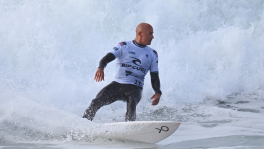 BELLS BEACH, AUSTRALIA - MARCH 26: Kelly Slater of the United States surfs in their first heat during the 2024 Rip Curl Pro Bells Beach on March 26, 2024 in Bells Beach, Australia. (Photo by Morgan Hancock/Getty Images)