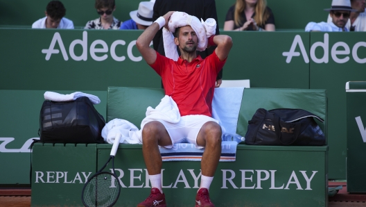 Serbia's Novak Djokovic reacts while playing against Casper Ruud, of Norway, during their Monte Carlo Tennis Masters semifinal match in Monaco, Saturday, April 13, 2024. (AP Photo/Daniel Cole)