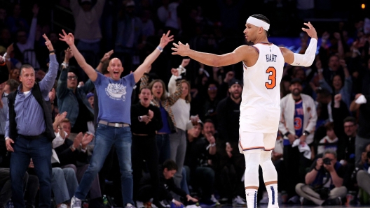 NEW YORK, NEW YORK - APRIL 20: Josh Hart #3 of the New York Knicks celebrates his three point shot late in the fourth quarter against the Philadelphia 76ers in game one of the Eastern Conference First Round Playoffs at Madison Square Garden on April 20, 2024 in New York City. The New York Knicks defeated the Philadelphia 76ers 111-104. NOTE TO USER: User expressly acknowledges and agrees that, by downloading and or using this photograph, User is consenting to the terms and conditions of the Getty Images License Agreement.   Elsa/Getty Images/AFP (Photo by ELSA / GETTY IMAGES NORTH AMERICA / Getty Images via AFP)