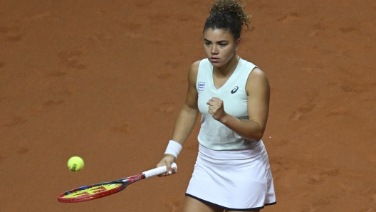 Italy's Jasmine Paolini reacts during her quarterfinals tennis match against Kazakhstan's Elena Rybakina at the WTA Tour in Stuttgart, Germany, Friday April 19, 2024. (Marijan Murat/dpa via AP)