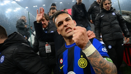 MILAN, ITALY - APRIL 22: Lautaro Martinez of FC Internazionale celebrates winning the 2024 Scudetto championship title, after the Serie A TIM match between AC Milan and FC Internazionale at Stadio Giuseppe Meazza on April 22, 2024 in Milan, Italy. (Photo by Mattia Pistoia - Inter/Inter via Getty Images)