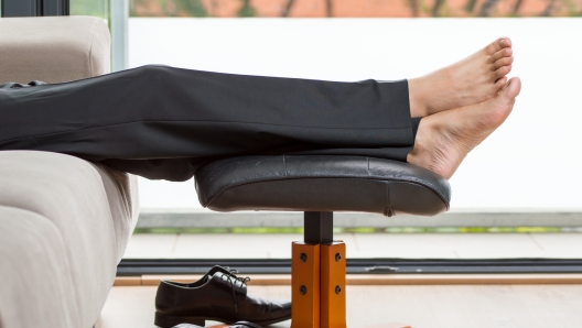 Businessman resting after work at home