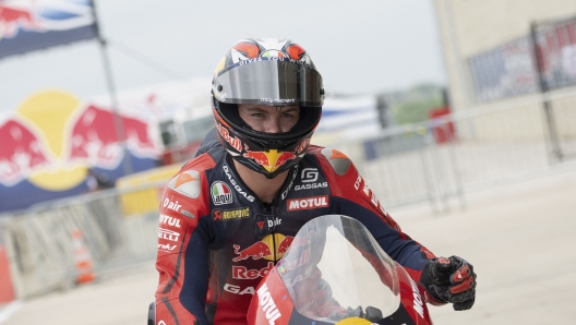 AUSTIN, TEXAS - APRIL 14: Daniel Holgado of Spain and Red Bull GASGAS Tech3 celebrates the second place under the podium during the Moto3 Race during the MotoGP Of The Americas - Race on April 14, 2024 in Austin, Texas.   Mirco Lazzari gp/Getty Images/AFP (Photo by Mirco Lazzari gp / GETTY IMAGES NORTH AMERICA / Getty Images via AFP)