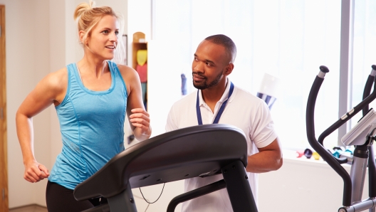 Patient Using Treadmill In Hospital Physiotherapy Department