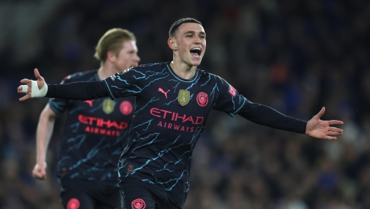 epa11301031 Manchester City's Phil Foden celebrates scoring  the 2-0 lead during the English Premier League soccer match of Brighton & Hove Albion against Manchester City, in Brighton, Britain, 25 April 2024.  EPA/NEIL HALL EDITORIAL USE ONLY. No use with unauthorized audio, video, data, fixture lists, club/league logos, 'live' services or NFTs. Online in-match use limited to 120 images, no video emulation. No use in betting, games or single club/league/player publications.