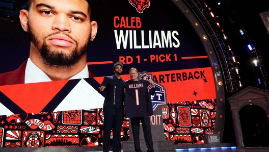 DETROIT, MICHIGAN - APRIL 25: (L-R) Caleb Williams poses with NFL Commissioner Roger Goodell after being selected first overall by the Chicago Bears during the first round of the 2024 NFL Draft at Campus Martius Park and Hart Plaza on April 25, 2024 in Detroit, Michigan.   Gregory Shamus/Getty Images/AFP (Photo by Gregory Shamus / GETTY IMAGES NORTH AMERICA / Getty Images via AFP)