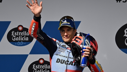 Ducati Spanish rider Marc Marquez celebrates after taking the pole position during the qualifier session of the MotoGP Spanish Grand Prix at the Jerez racetrack in Jerez de la Frontera on April 27, 2024. (Photo by JORGE GUERRERO / AFP)