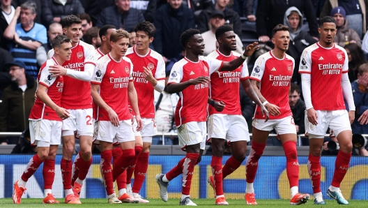 epa11306684 Arsenalâ??s players celebrate after Kai Havertz (2L) scored Arsenalâ??s 3-0 lead during the English Premier League soccer match between Tottenham Hotspur against Arsenal FC in London, Britain, 28 April 2024.  EPA/ANDY RAIN EDITORIAL USE ONLY. No use with unauthorized audio, video, data, fixture lists, club/league logos, 'live' services or NFTs. Online in-match use limited to 120 images, no video emulation. No use in betting, games or single club/league/player publications.