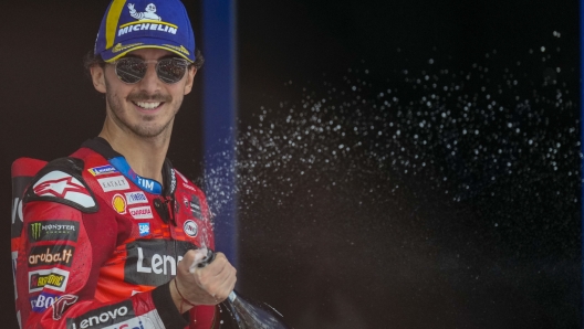 Italian rider Francesco Bagnaia of the Ducati Lenovo Team sprays champagne to celebrate his victory in the MotoGP race of the Spanish Motorcycle Grand Prix at the Angel Nieto racetrack in Jerez de la Frontera, Spain, Sunday, April 28, 2024. (AP Photo/Jose Breton)