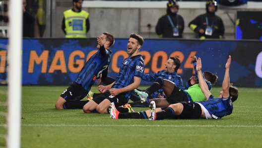 Atalanta's players celebrate at the end of the semifinal 2nd leg soccer match Atalanta BC vs ACF Fiorentina at the Gewiss Stadium in Bergamo, Italy, 24 March 2024. ANSA/MICHELE MARAVIGLIA