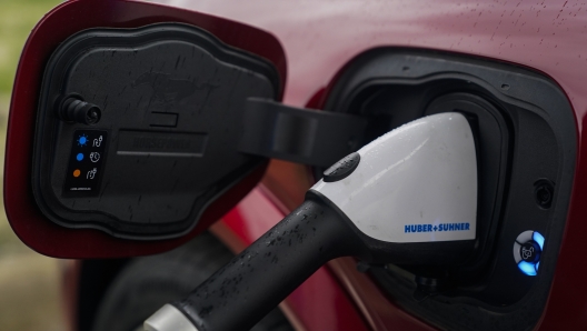 A 2023 Ford Mustang Mach-E charges, Friday, March 8, 2024, at an electric vehicle charging station in London, Ohio. The charging ports are a key part of President Joe Biden?s effort to encourage drivers to move away from gasoline-powered cars and trucks that contribute to global warming. (AP Photo/Joshua A. Bickel)