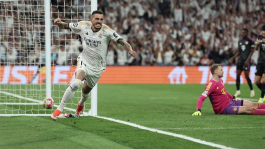 Real Madrid's Spanish forward #14 Joselu celebrates scoring his team's first goal during the UEFA Champions League semi final second leg football match between Real Madrid CF and FC Bayern Munich at the Santiago Bernabeu stadium in Madrid on May 8, 2024. (Photo by Thomas COEX / AFP)