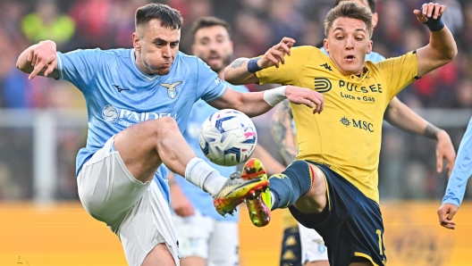 Lazios Spanish defender Gil Patric (left) and Genoas Italian forward Mateo Retegui during the Italian Serie A soccer match Genoa Cfc vs Ss Lazio at Luigi Ferraris stadium in Genoa, Italy, 19 April 2024. ANSA/STRINGER