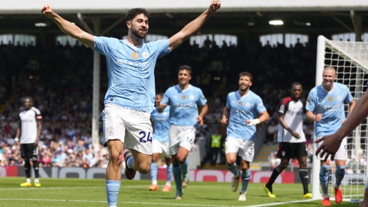 Manchester City's Josko Gvardiol celebrates after scoring his side's third goal during the English Premier League soccer match between Fulham and Manchester City at the Craven Cottage Stadium in London, Saturday, May 11, 2024. (AP Photo/Kirsty Wigglesworth)