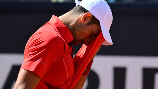 Serbia's Novak Djokovic gestures during his match against Chile's Alejandro Tabilo at the Men's ATP Rome Open tennis tournament at Foro Italico in Rome on May 12, 2024. (Photo by Tiziana FABI / AFP)