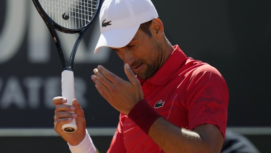 Serbia's Novak Djokovic reacts during a match against Chile's Alejandro Tabilo at the Italian Open tennis tournament in Rome, Sunday, May 12, 2024. (AP Photo/Alessandra Tarantino)