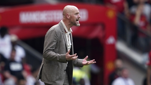 Manchester United's head coach Erik ten Hag gives instructions during the English Premier League soccer match between Manchester United and Arsenal at the Old Trafford Stadium in Manchester, England, Sunday, May 12, 2024. (AP Photo/Dave Thompson)