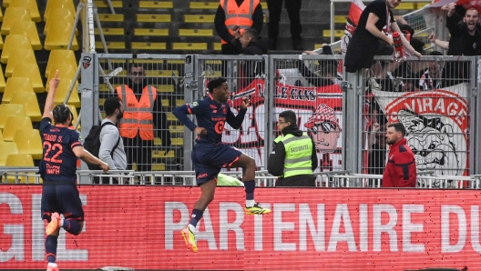 Lilles Canadian forward #9 Jonathan David celebrates a first goal during the French L1 football match between FC Nantes and LOSC Lille at the Stade de la BeaujoireLouis-Fonteneau in Nantes, western France, on May 12, 2024. (Photo by Sebastien SALOM-GOMIS / AFP)