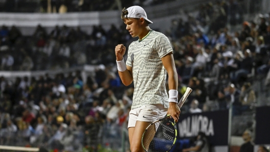 Holger Rune of Denmark celebrates during the match against Luca Nardi of Italy (not pictured) during their men's singles match at the Italian Open tennis tournament in Rome, Italy, 11 May 2024. ANSA/ALESSANDRO DI MEO