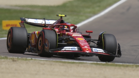 Ferrari driver Carlos Sainz of Spain steers his car during the third practice at the Dino and Enzo Ferrari racetrack in Imola, Italy, Imola, Saturday, May 18, 2024. The Italy's Emilia Romagna Formula One Grand Prix will be held on Sunday. (AP Photo/Luca Bruno)