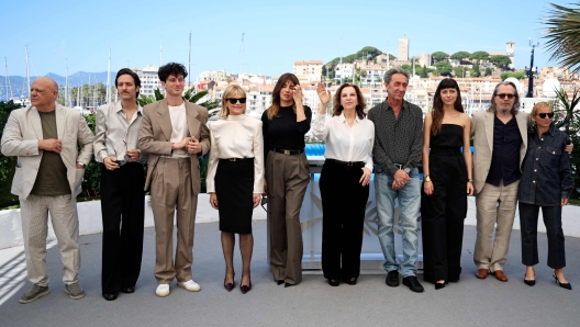 (FromL) Italian actor Peppe Lanzetta, Italian actor Dario Aita, Italian actor Daniele Rienzo, Italian actress Isabella Ferrari, Italian actress Luisa Ranieri, Italian actress Stefania Sandrelli, Italian director Paolo Sorrentino, Italian actress Celeste Dalla Porta, British actor Gary Oldman and Daniela Sorrentino pose during a photocall for the film "Parthenope" at the 77th edition of the Cannes Film Festival in Cannes, southern France, on May 22, 2024. (Photo by Valery HACHE / AFP)