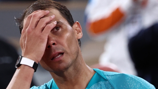 Spain's Rafael Nadal reacts after losing his men's singles match against Germany's Alexander Zverev on Court Philippe-Chatrier on day two of the French Open tennis tournament at the Roland Garros Complex in Paris on May 27, 2024. (Photo by EMMANUEL DUNAND / AFP)